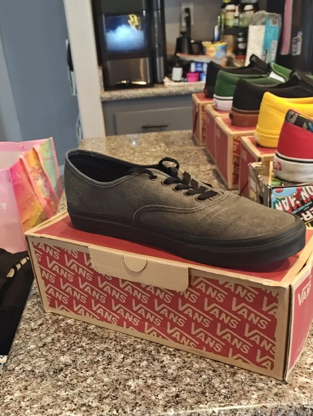 Vans Gray Canvas Low Top Sneakers with Red Midsole Accent